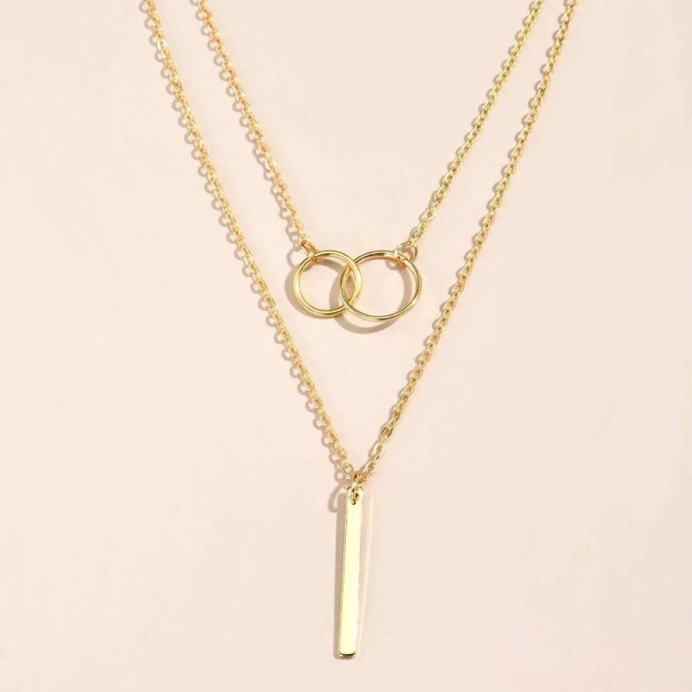 Collar retro dorado con colgante de doble círculo