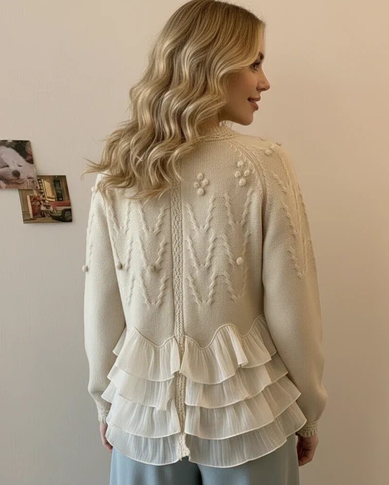 Nina – Cárdigan elegante con volantes