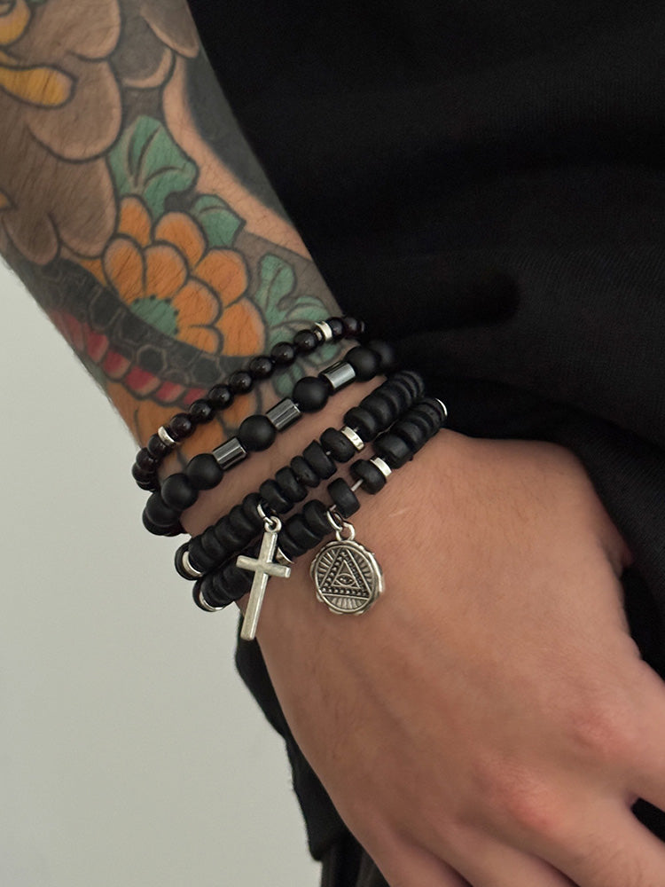 Set de 4 pulseras  de cuentas con cruz