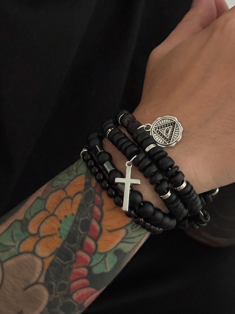 Set de 4 pulseras  de cuentas con cruz